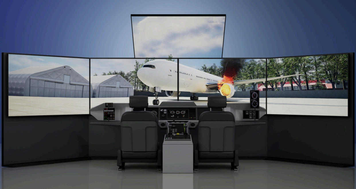 ETCPZL advanced driving simulator with dual-seat configuration and wide-screen display showing aircraft engine fire scenario